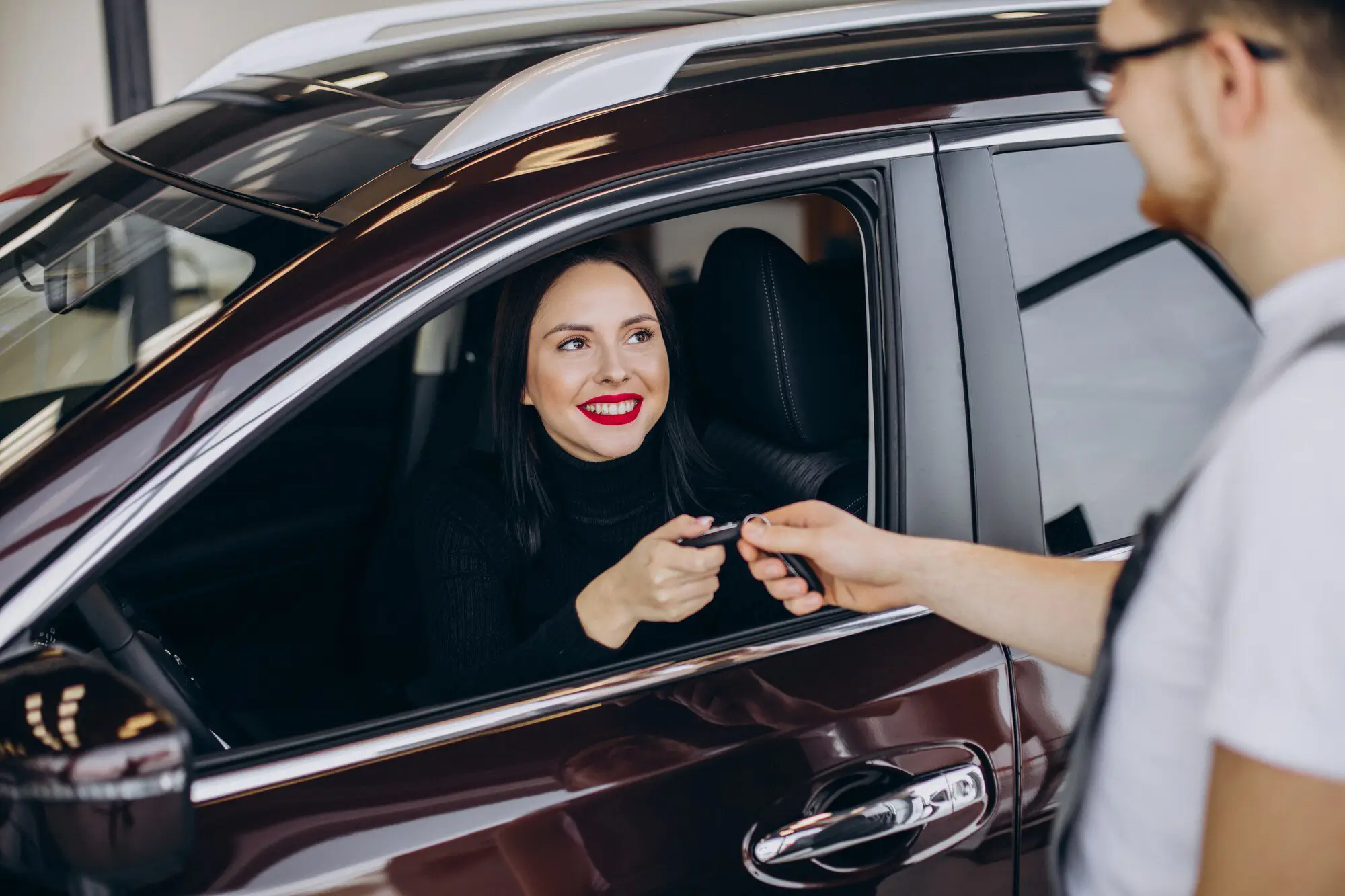 mechanic-with-client-car-service-station_1303-26915